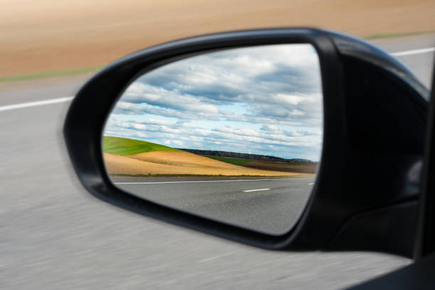view of the outside car rearview mirror stock photo