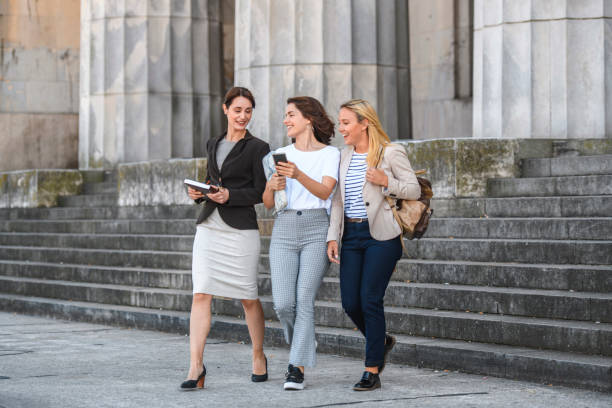 istock Smiling Young Female Law Students Leaving School Building 1222487220