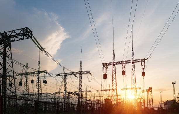 istock distribution electric substation with power lines and transformers, at sunset. 1222487919