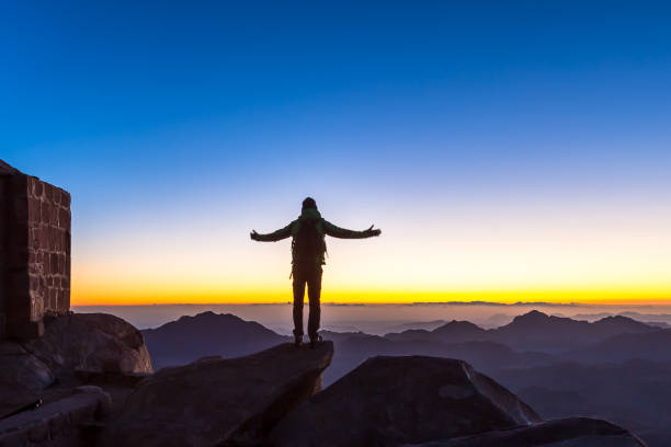 istock Man with open arms. Mount Sinai, Mount Moses in Egypt. 1222491078