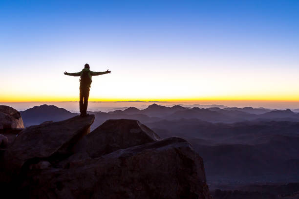 istock Man with open arms. Mount Sinai, Mount Moses in Egypt. 1222491100