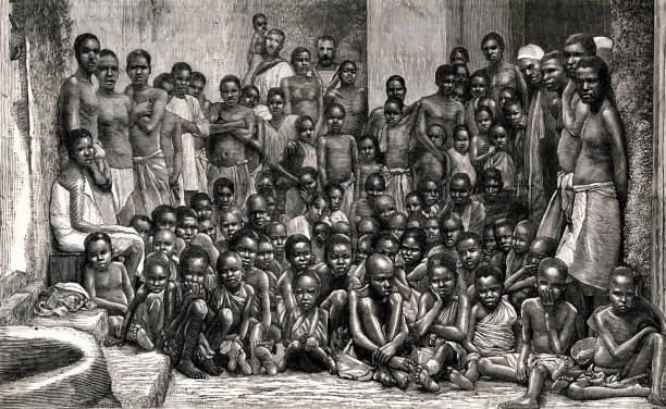 African Slave Trade Vintage engraving shows a crowd of African men, women, and children who had been rescued by the British navy from a slaving vessel in 1884. Two British sailors from the HMS Undine are seen in the background. Although the slave trade was abolished in many countries during the 19th century, slave trading continued in other countries. malnourished stock illustrations