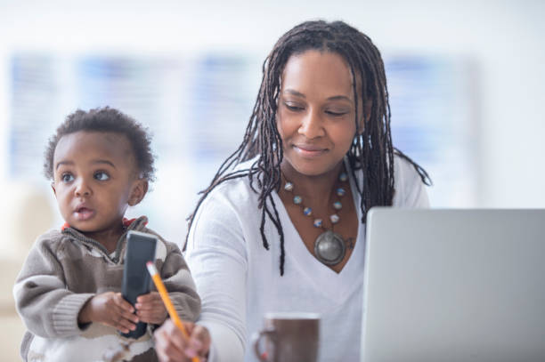 istock Mother and young son working from home 1222492671