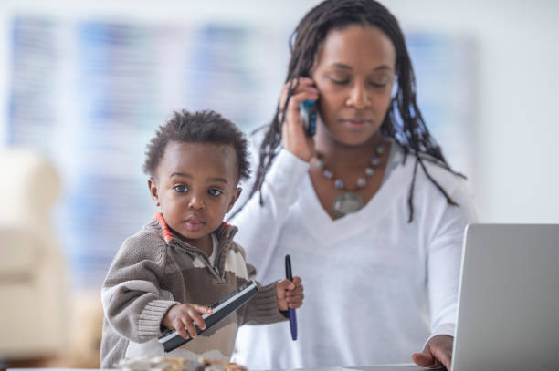 istock Mother and young son working from home 1222492679