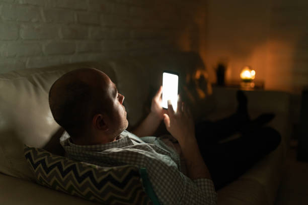istock Caucasian man texting his girlfriend at night 1222495856