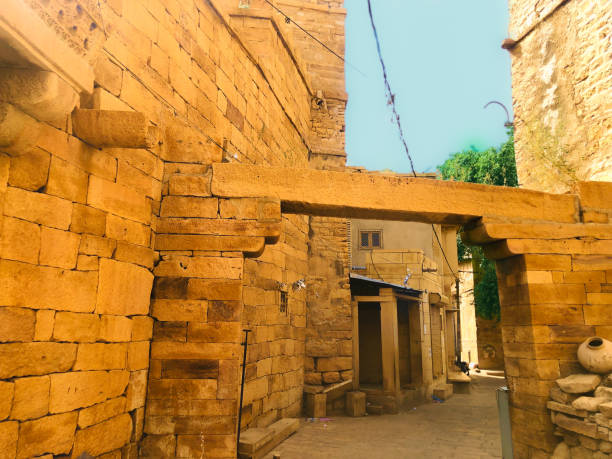 Street Inside the Jaisalmer Fort A narrow street inside the Jaisalmer fort. This street headed to the old hindu temple getty image stock pictures, royalty-free photos & images