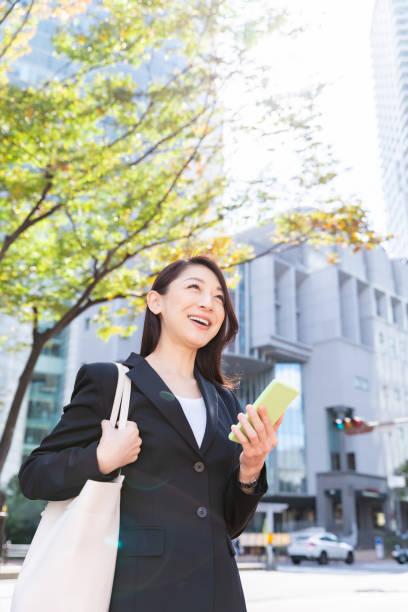 istock asian woman who see a smart phone 1222495970