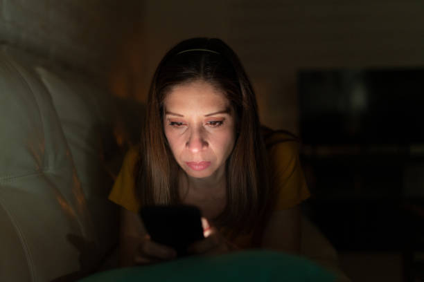 istock Serious woman looking at a smartphone 1222495975
