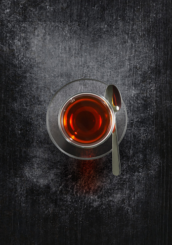 Lemon tea cup with tea bag on the table