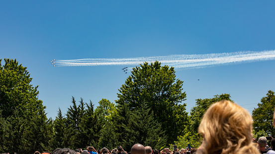 Atlanta, USA - May 2, 2020: People watch as AF Thunderbirds circle city to salute healthcare workers