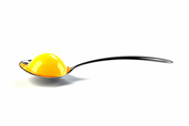 istock Illustration of egg yolk on a spoon in 3D rendering 1222513592