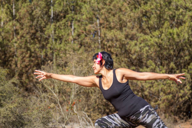 istock Mature Woman doing pilates exercises outsite 1222518322