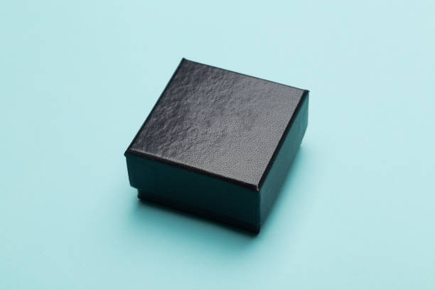 istock Mini black box product packaging isolated on blue background 1222519259