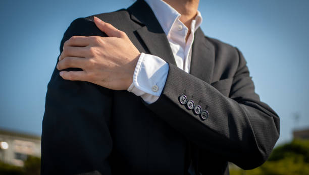 istock A businessman with a sore shoulder 1222519503