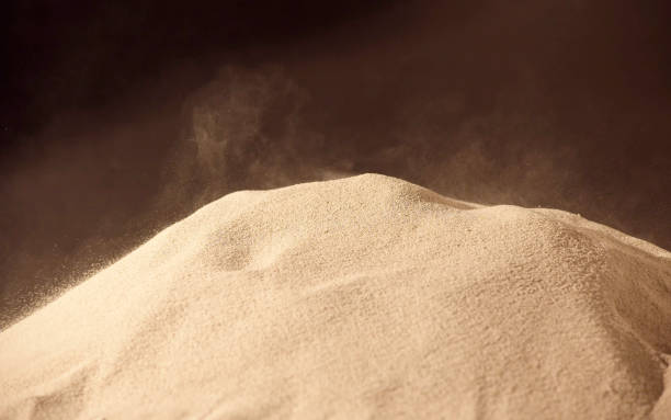 istock Close up view of sand blowing over sand dune 1222519673