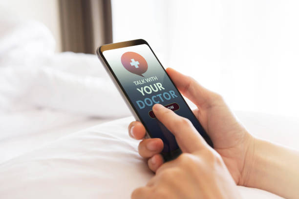 istock Helathy Lifestyle and Technology Concept. Modern Person Using Online Medicine Application via Mobile Phone to Request a Consultation from the Doctor about their Health 1222521593