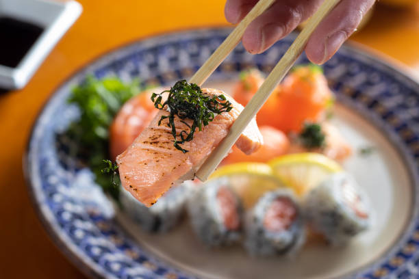 istock Sushi, sashimi And temaki Plated on wooden table 1222522703