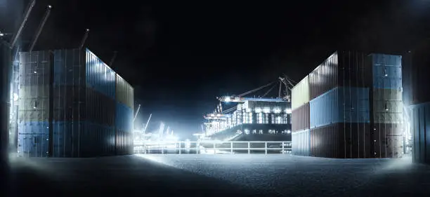 Photo of Container port at night