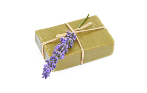 istock Handmade olive soap and lavender flower isolated on white background. 1222525261