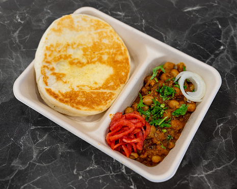 Indian Food on a Disposable Paper food grade container