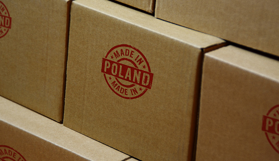 Made in Poland stamp printed on cardboard box. Factory, manufacturing and production country concept.