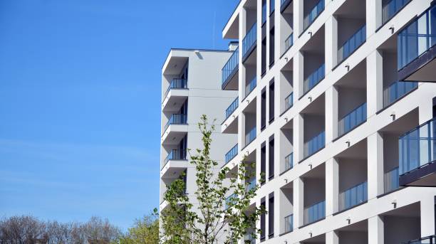 istock Modern condo building with big windows and modern facade. 1222528392