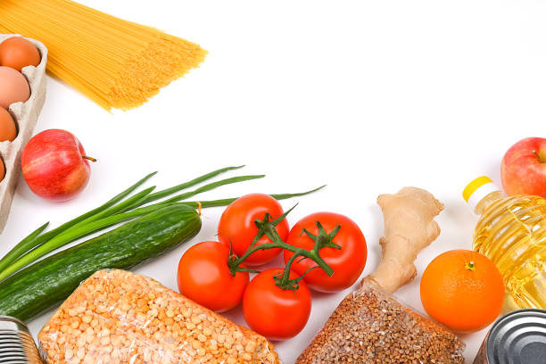 istock Various food items, fruits and vegetables on a white background. Copyspace. 1222534710