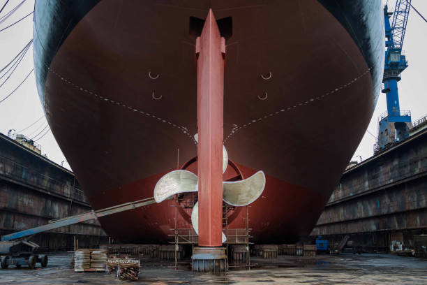 Propeller Rudder and propeller of crude oil super tanker in dry dock repair propeller stock pictures, royalty-free photos & images