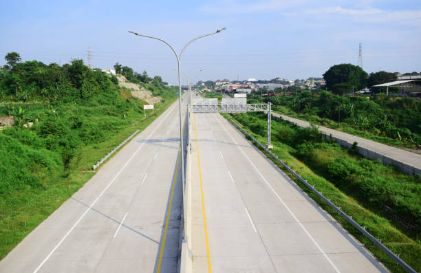 istock Quiet Road - The highway is quiet from above 1222537706