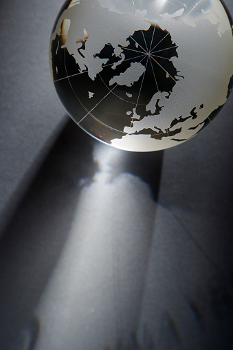 glass globe on the gray background
