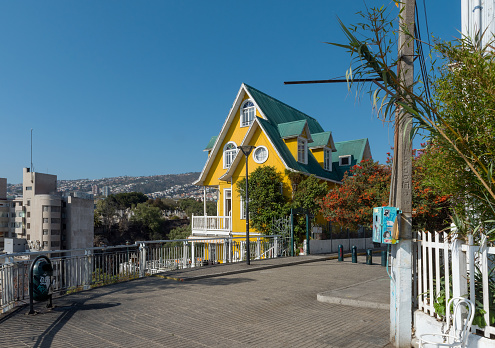 valparaiso, chile-february 26, 2020: Beautiful traditional yellow wooden building
