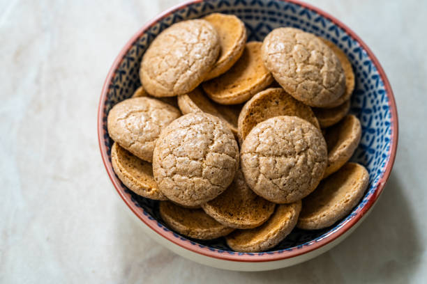 istock Chewy Soft Italian Amaretti Cookie Biscuits in Ceramic Bowl. 1222541094