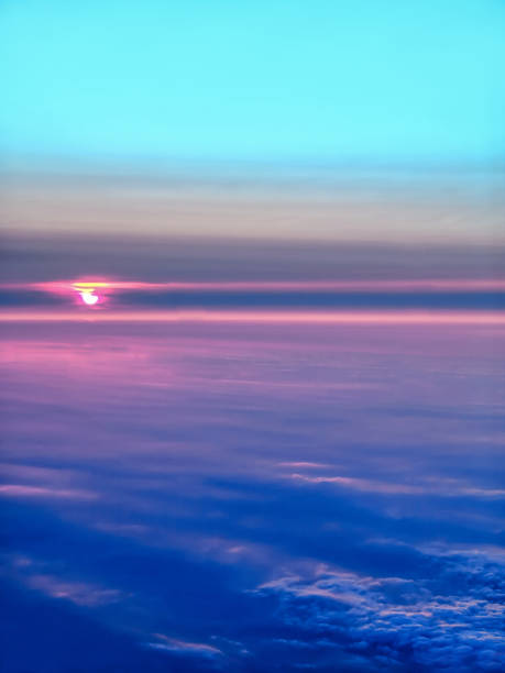 istock Pink sunset above the clouds 1222541250
