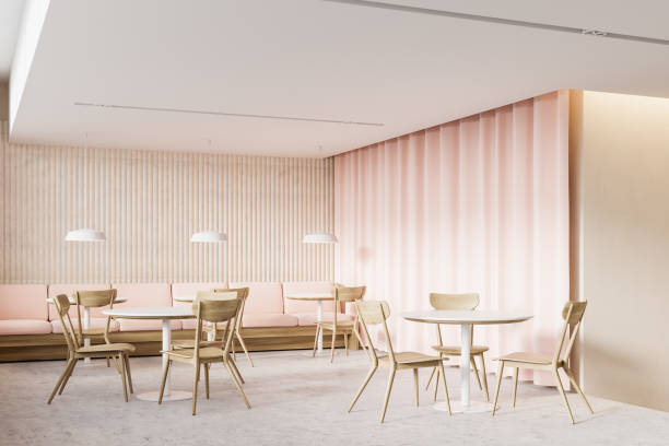 istock Stylish canteen with sofa and round tables 1222541819