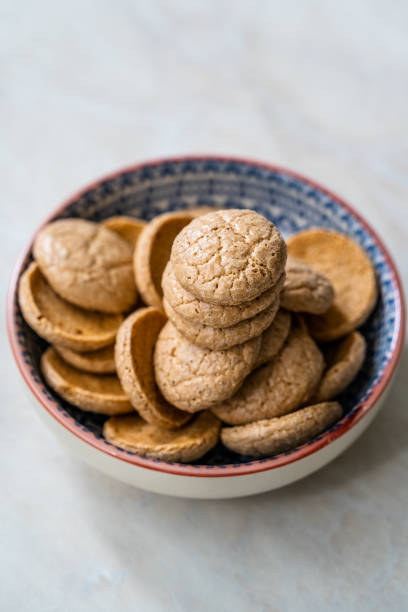istock Chewy Soft Italian Amaretti Cookie Biscuits in Ceramic Bowl. 1222542403