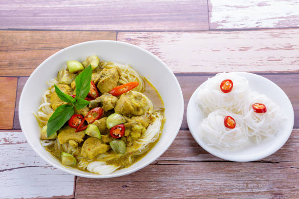 istock Green curry chicken with rice noodles 1222543449