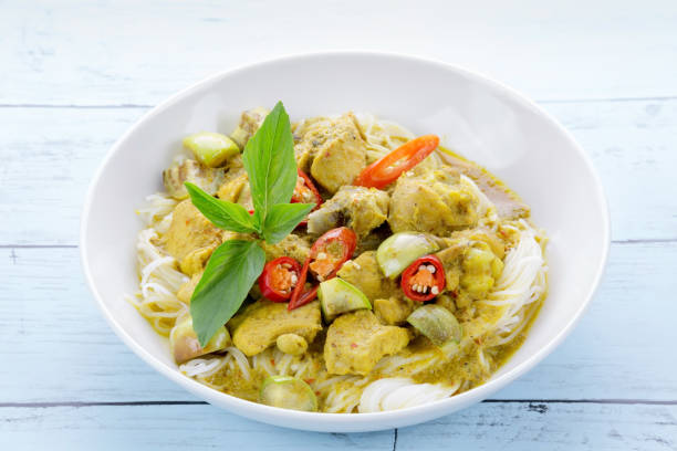 istock Green curry chicken with rice noodles 1222543553