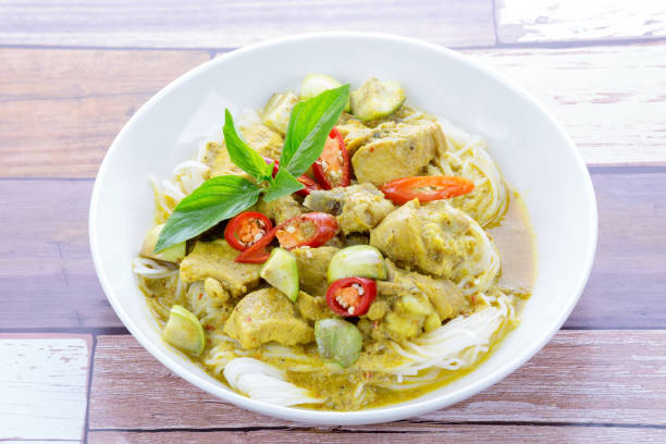 istock Green curry chicken with rice noodles 1222543596