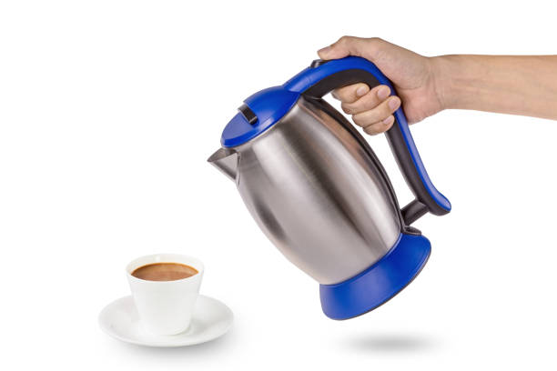 istock Electric pot with coffee cup isolated 1222543794