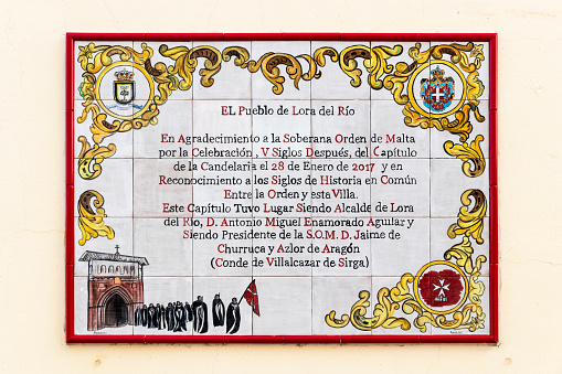 Lora del Rio, Spain. Commemorative plaque of the Sovereign Military Order of Malta in this town in Andalucia