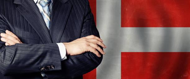 männliche hände vor dänischem flaggenhintergrund, wirtschaft, politik und bildung in dänemark konzept - fractal fern stock-fotos und bilder