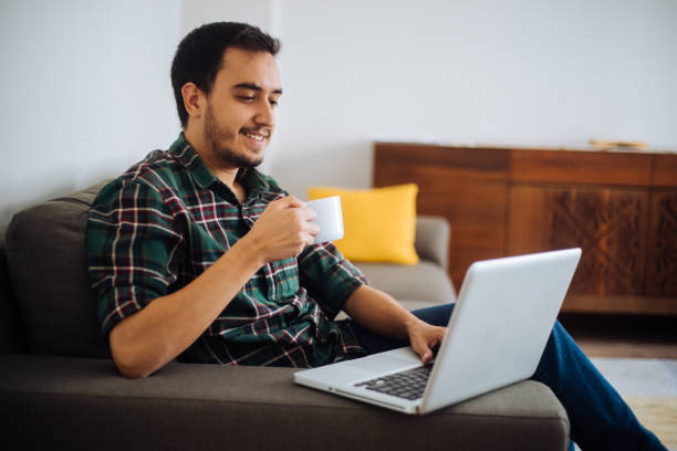 istock Young man working in his home office 1222546825