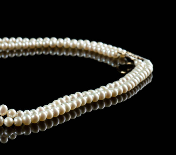 istock pearl diamond necklace 1222547515
