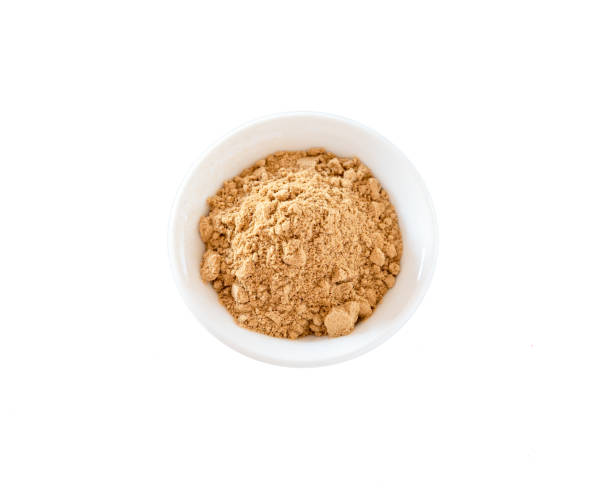 istock Curry Powder on a White Bowl and White Background 1222552229
