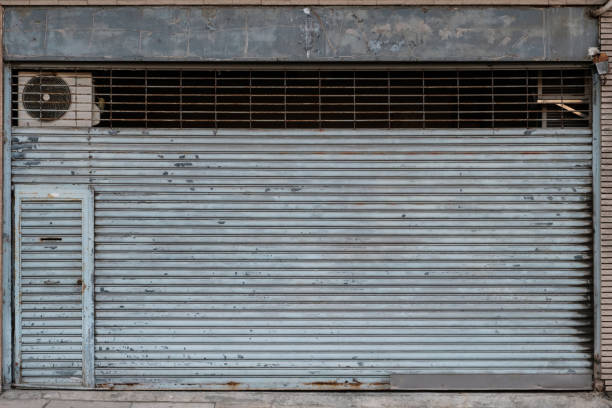 istock vintage store or shop with closed metal shutter  - 1222557769