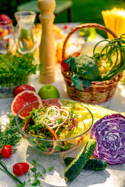 istock fresh vegetarian salad with carrot lettuce leaves 1222559087