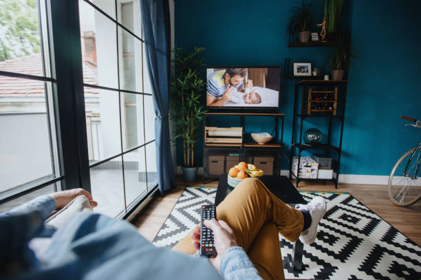 istock Senior man watching TV at home 1222559465