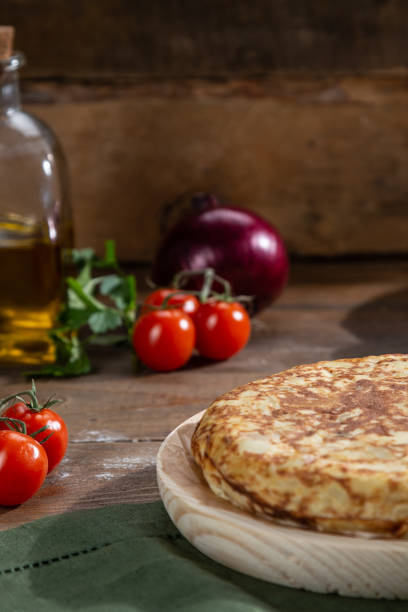 istock Traditional spanish omelette on wooden table 1222560751