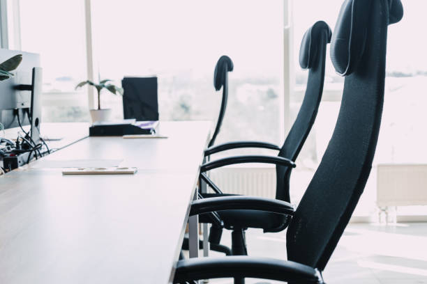 istock modern office chair near the desktop with office. new workplace concept 1222561705