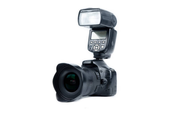 istock Photo camera and flash isolated on a white background. Copy space. 1222562296